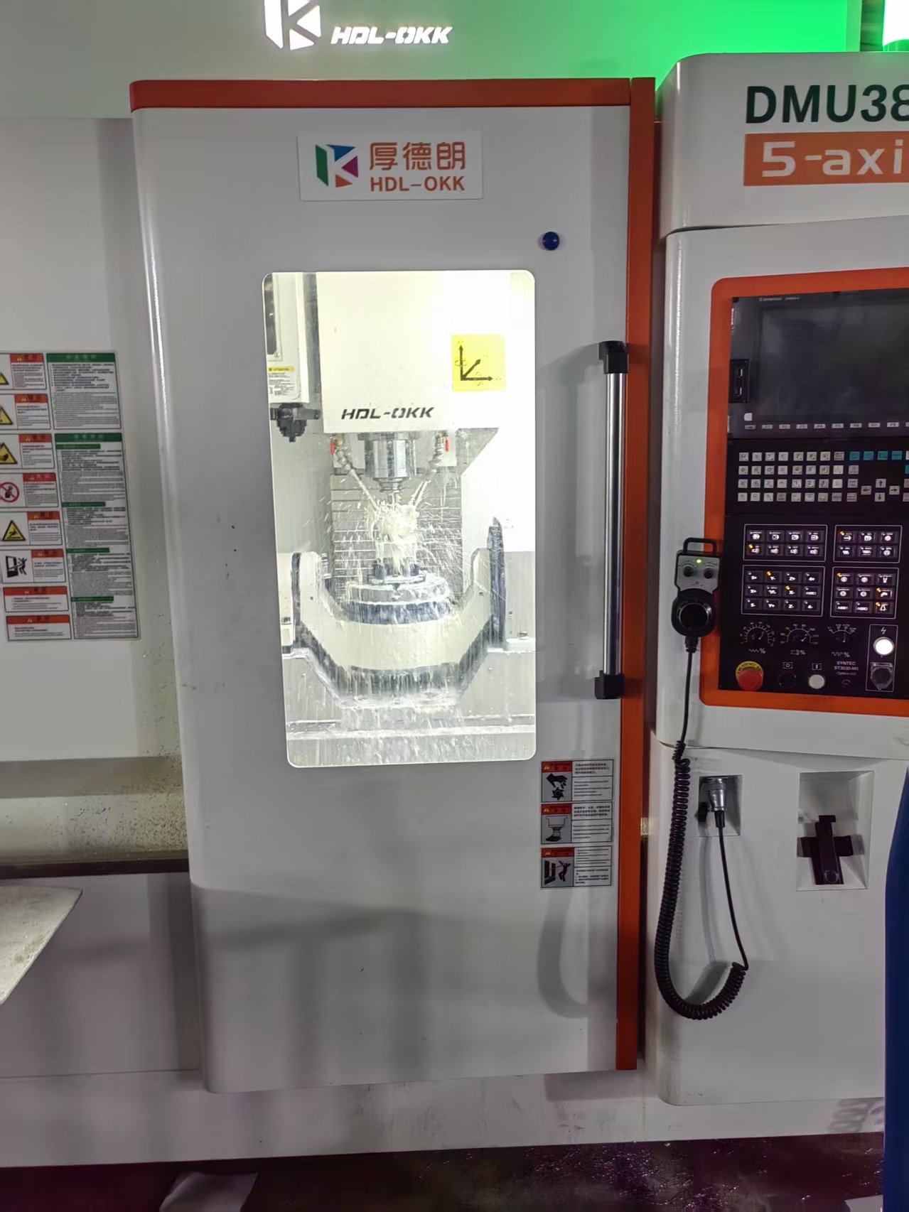 Sheet metal fabrication vs CNC machining - five-axis machining centre at XCWY