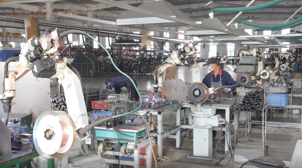 MIG and laser welding of metal enclosure frames